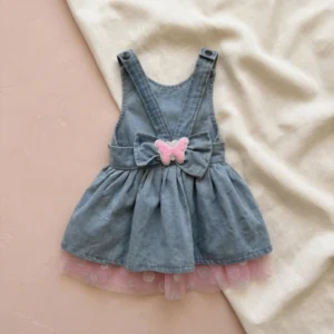 jean jacket dress with pink bow flatlay 1 1 2x